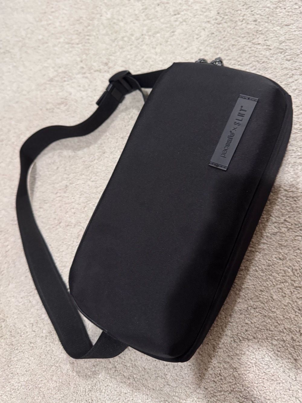 LIKE NEW Pacsafe® x SLNT® Anti-Theft Sling in Black